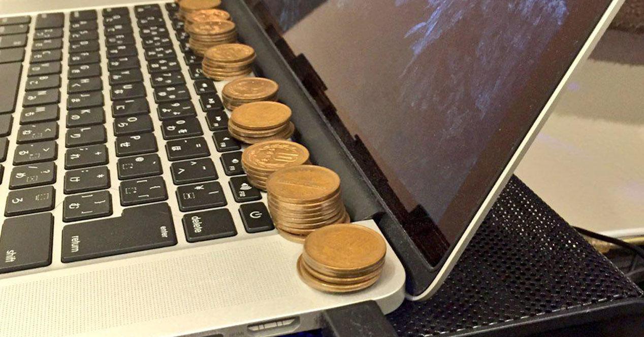 macbook monedas
