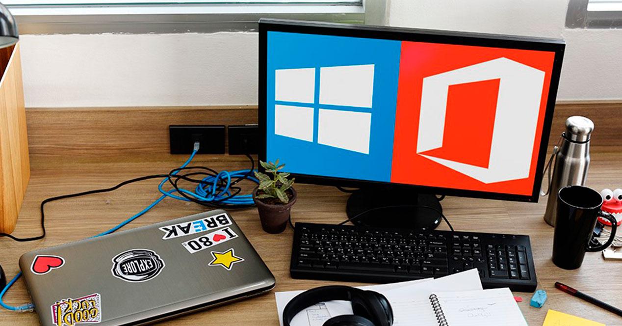 ordenador con logo de windows y office