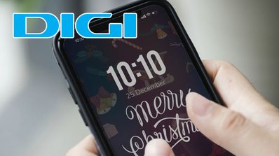 logo digi sobre smartphone con mensaje de Feliz Navidad