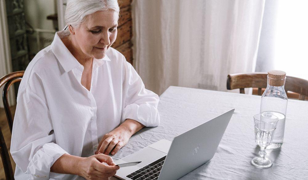 Senior lady shopping in an online store