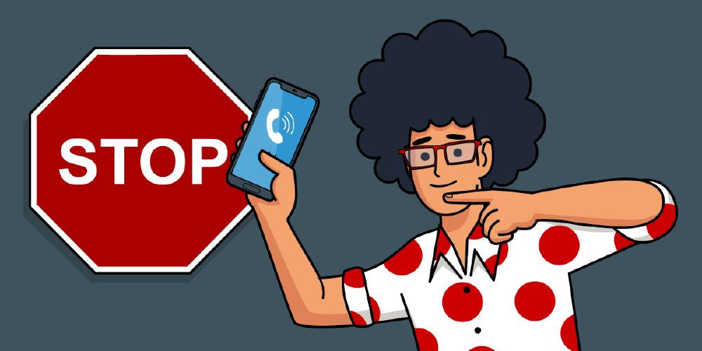 Mascota de Pepephone con un móvil en la mano y una señal de stop