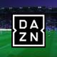 El logo de DAZN en el medio de un campo de fútbol con un partido en disputa