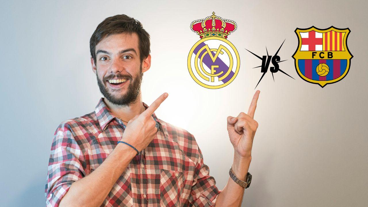 Un futbolero apunta con los dedos a los escudos de Real Madrid y Barcelona