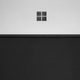 ordenador de Microsoft sobre fondo negro