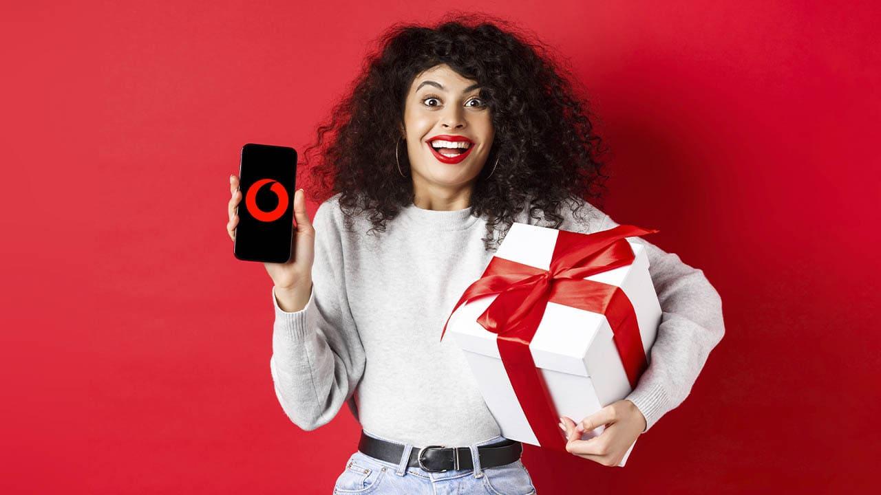 mobile girl with Vodafone logo and a gift