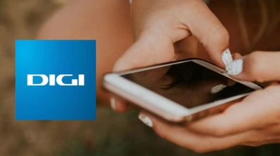 Un iPhone mostrando la pantalla de inicio junto a una tarjeta SIM de Digi sobre una superficie de madera, ilustrando el problema de configuración para compartir internet.