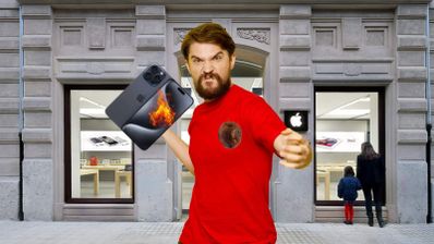 Un hombre enfadado preparándose para lanzar el iPhone