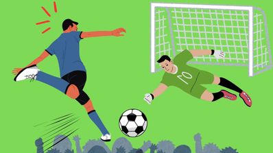 Un jugador de fútbol disparando a portería