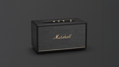 Altavoz Marshall Stanmore III en color negro, mostrando su diseño frontal con la icónica rejilla de tela y el logo dorado de la marca