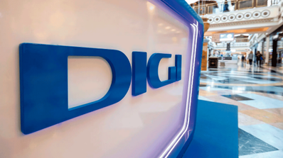 Stand promocional de Digi en un evento de tecnología