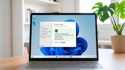 Interfaz de Microsoft Defender en Windows 11 mostrando la pantalla de protección contra virus y amenazas con el escudo verde y las opciones activadas