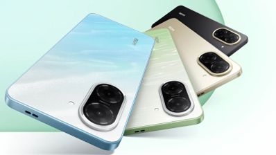 Parte trasera de cuatro smartphones Redmi posicionados en abanico con colores azul degradado, verde claro, dorado y negro mostrando su doble cámara circular.
