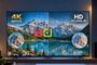 Televisor que muestra una comparación dividida entre la calidad de imagen 4K nativo y la resolución HD en un canal 4K de la TDT, correspondiente al registro 22T155424.