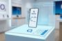 Teléfono móvil sobre un expositor digital de O2 en una tienda física de la operadora.