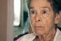 Primer plano de Maricarmen con expresión atenta y seria.