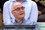 Hombre mayor con gafas interviniendo en un plató de televisión con subtítulos sobre economía.