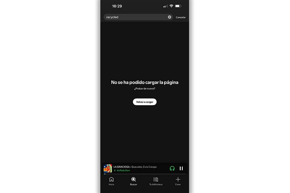 Interfaz de la aplicación Spotify mostrando un aviso de fallo en la carga de contenido sobre fondo negro.