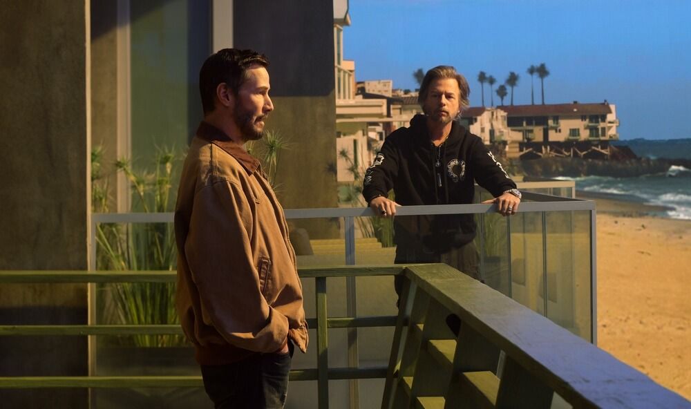 Keanu Reeves con David Spade