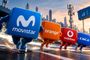 Personajes con forma de cubo representando a Movistar, Orange, Vodafone y DIGI corriendo en una pista de atletismo.